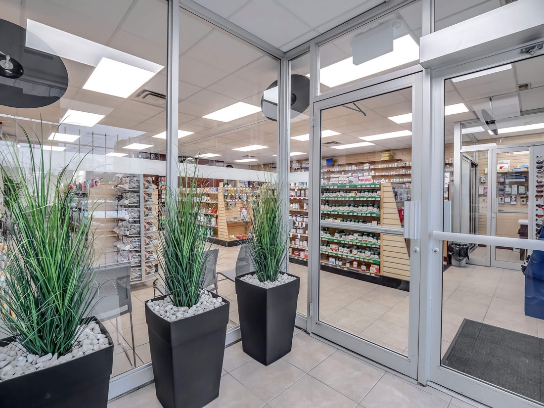 Inside Marcos Pharmacy — bright modern interior with wellness shelves